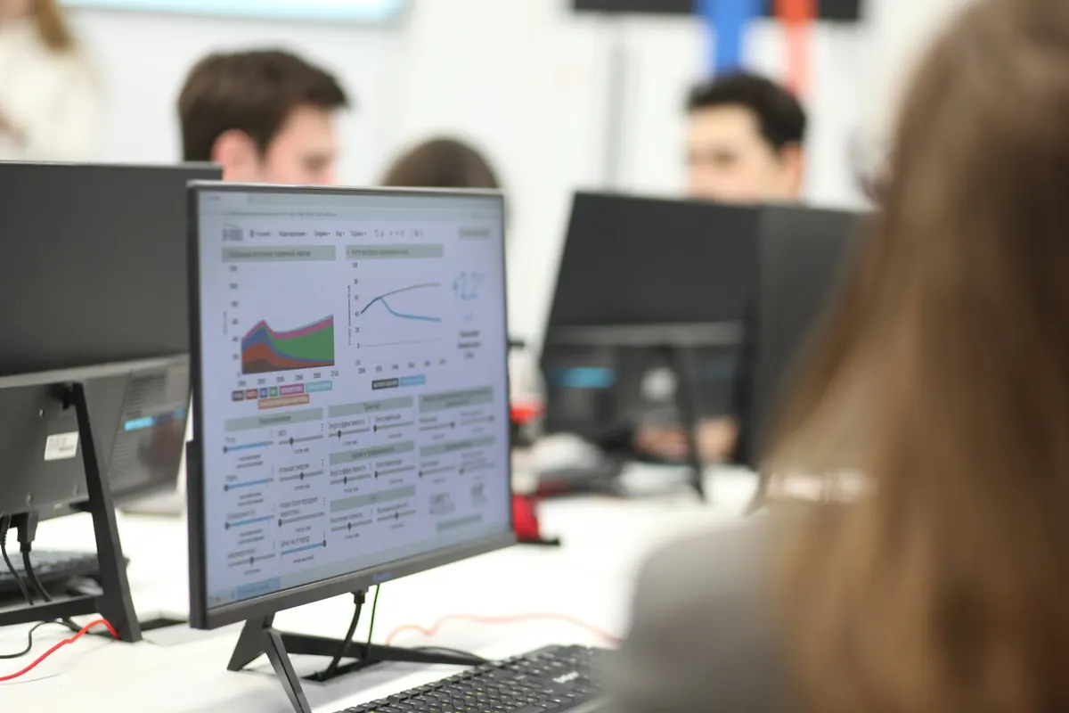 Office monitor displaying a web analytics dashboard