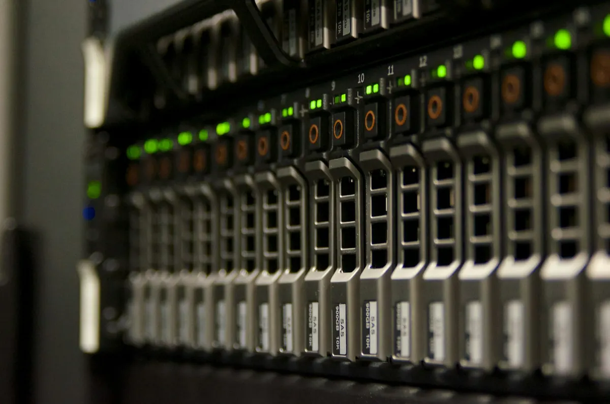 Server rack with rows of green status lights